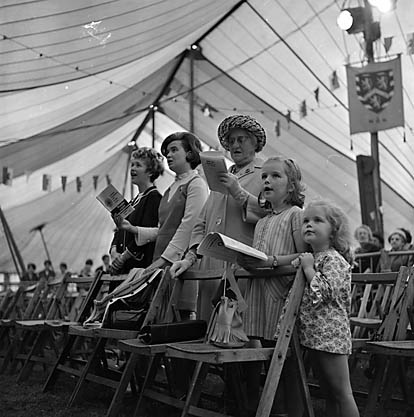 Image of family singing at the 1968 Eisteddfod in Llanrwst